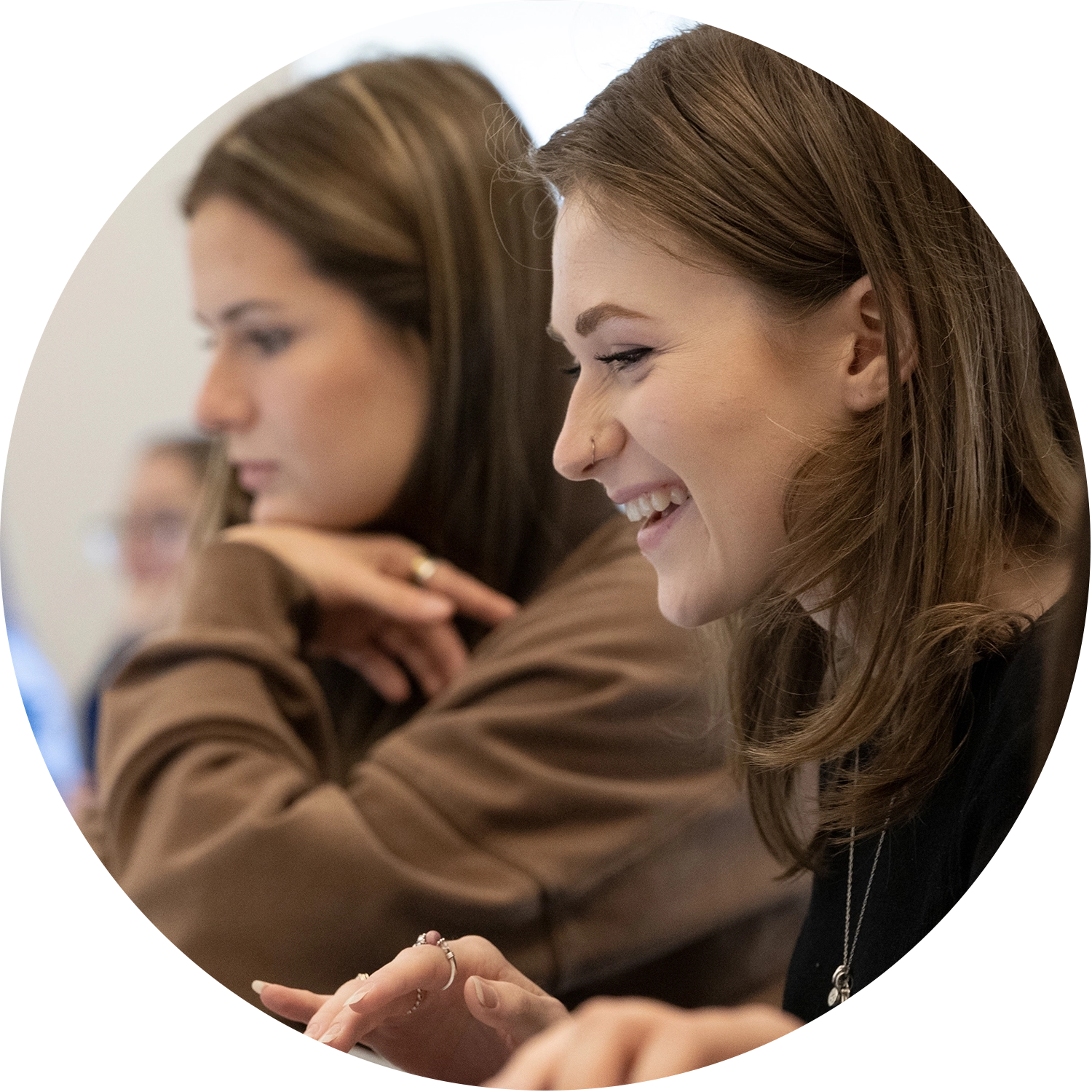 College of Business Students focused in class and smiling