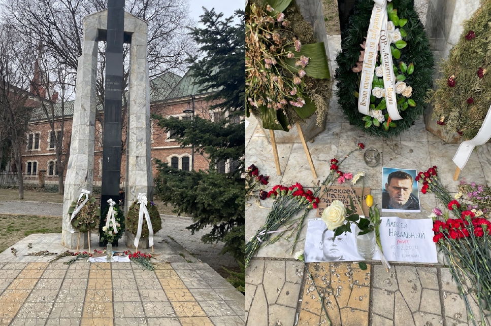 Varna Monument A memorial site with a tall stone monument flanked by white floral wreaths and ribbons. Flowers and photos are placed at the base, conveying respect and remembrance.