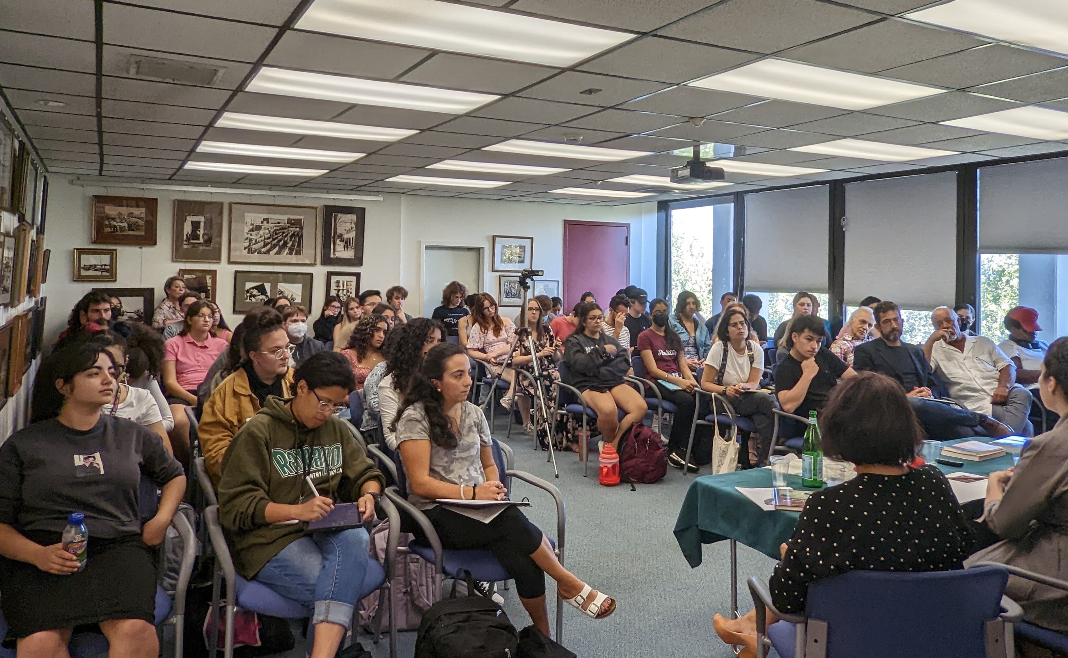 photo of the Center during a lecture, full of people