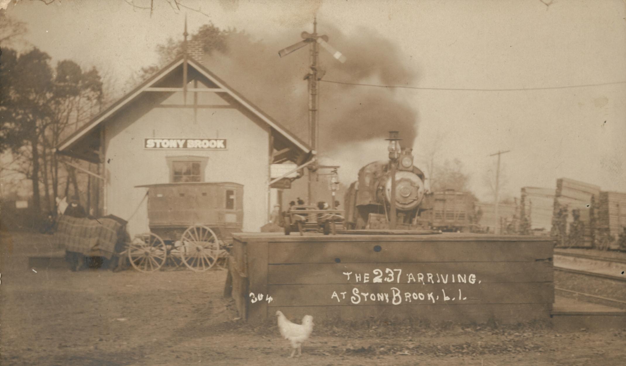 Sepia-toned photograph attributed to Arthur S. Greene showing the arrival of the 2:37pm train at the Stony Brook depot. The Stony Brook station is part of the Port Jefferson Branch of the Long Island Rail Road. 