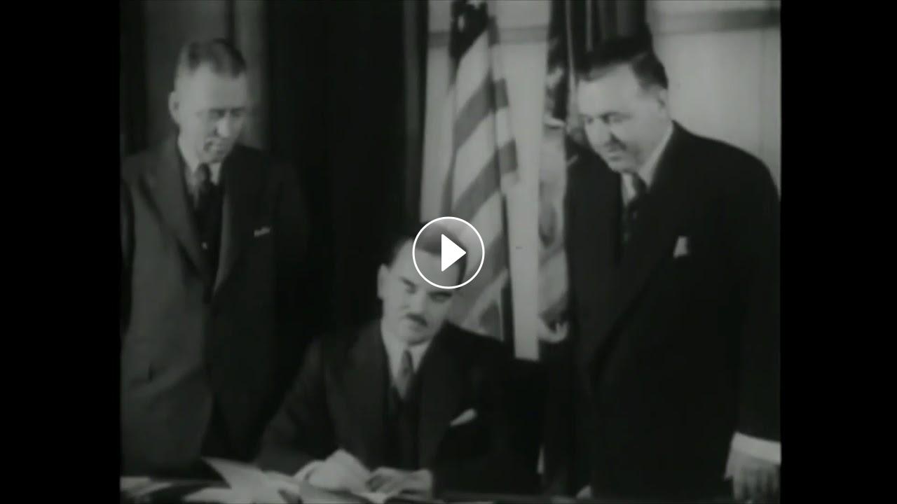 Governor Dewey signs