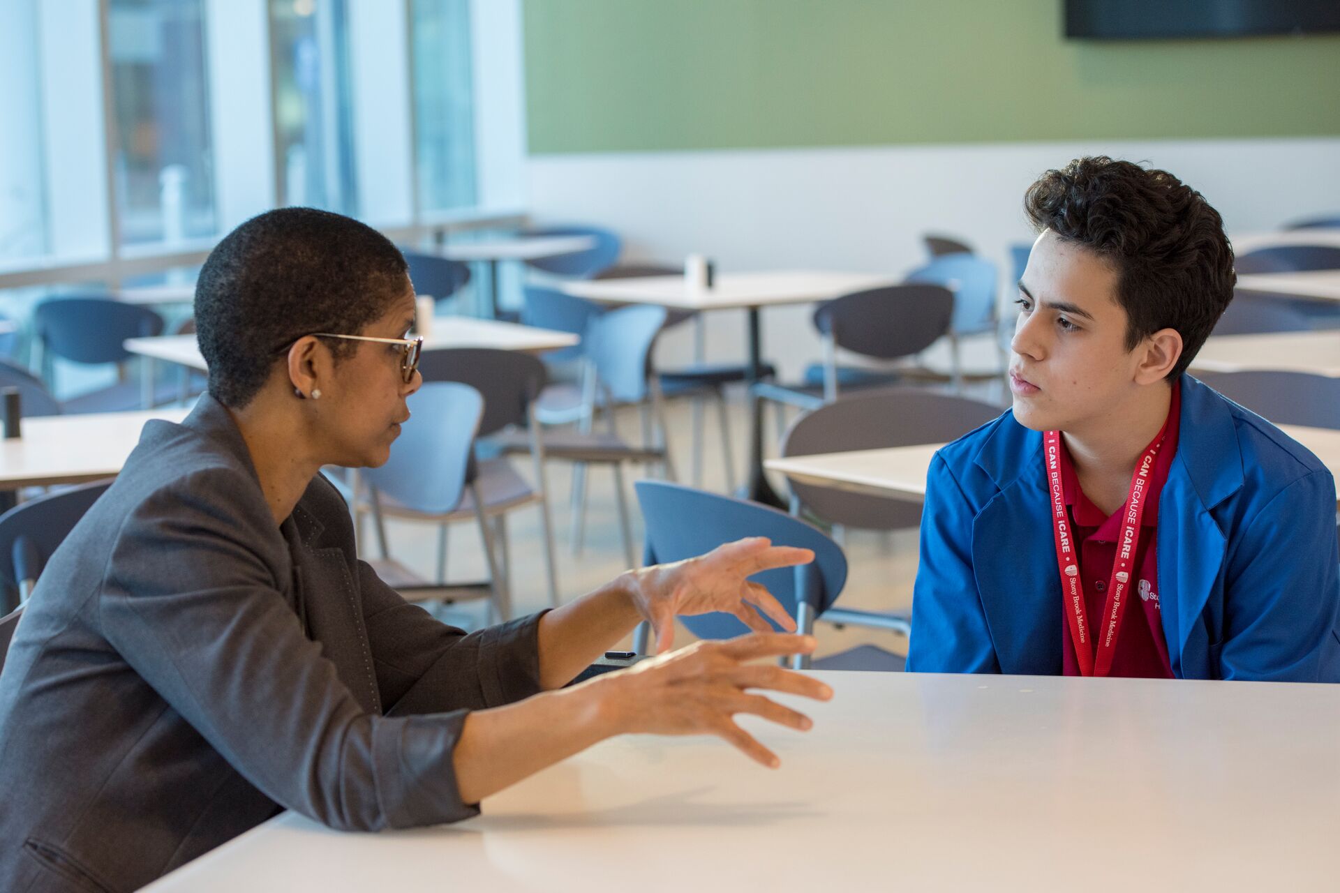 student and professor talking