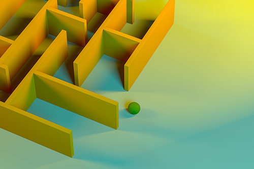 6 pencils stood up, leaning against a wall