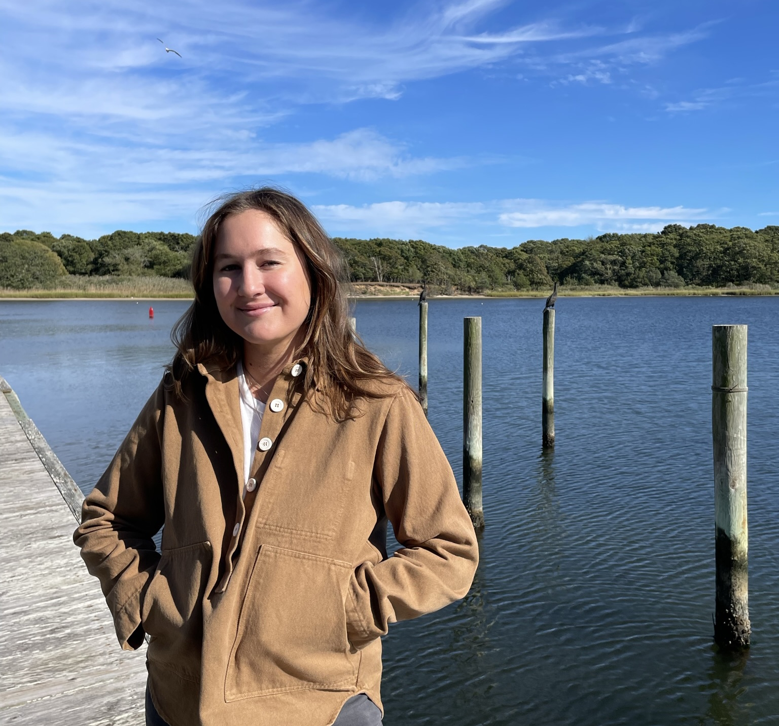 Molly Adams Molly Adams standing at a dock